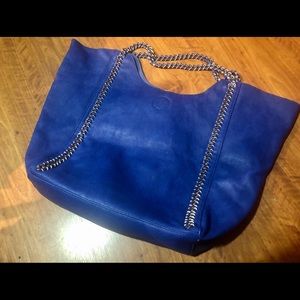 Leather handbag with matching cosmetic bag